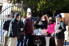 Members of the Asian Real Estate Association of America prepare to deliver face masks to residents in Flushing, N.Y. The volunteers were joined by U.S. Rep. Grace Meng (third from left), who represents Queens in New York’s 6th Congressional District. Photo by the Rev. Thomas Kim, UM News.