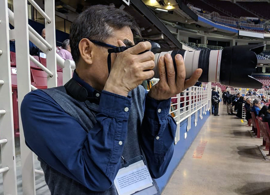 Thomas Kim with UM News takes a photo during the 2019 special session of the General Conference of The United Methodist Church in St. Louis. Photo by the Rev. Stacey Harwell-Dye, West End United Methodist Church, Nashville, TN.