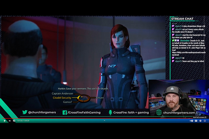 O Rev. David Petty, mostrado na imagem inserida no canto inferior direito, joga o videogame Mass Effect online. Petty, pastor sênior da Igreja Metodista Unida de San Pablo (IMU) em Colorado Springs, Colorado, está no ministério com a comunidade de jogos desde 2017. Captura de tela do YouTube por MU News.
