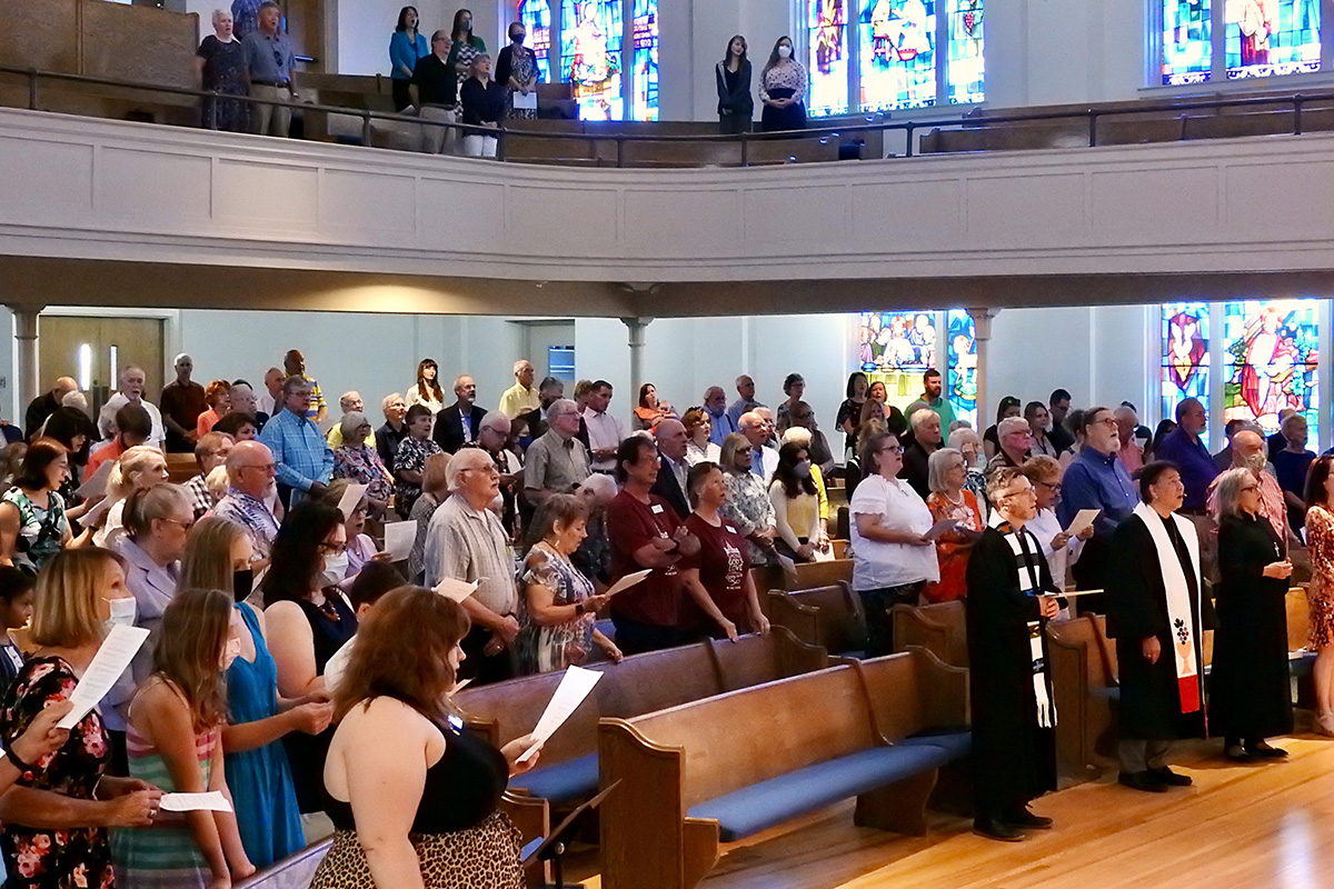 The First United Methodist Church in Denton, Texas, joins in worship on June 6, the first time the sanctuary had been used for that purpose since the COVID-19 pandemic forced building closures all over the U.S. Photo by Sam Hodges, UM News.