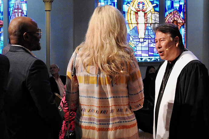 The Rev. Don Lee, senior pastor of First United Methodist Church in Denton, Texas, greets people arriving for a June 6 service. Lee says the church wants to draw on lessons learned during the pandemic, including continuing its online presence. Photo by Sam Hodges, UM News.