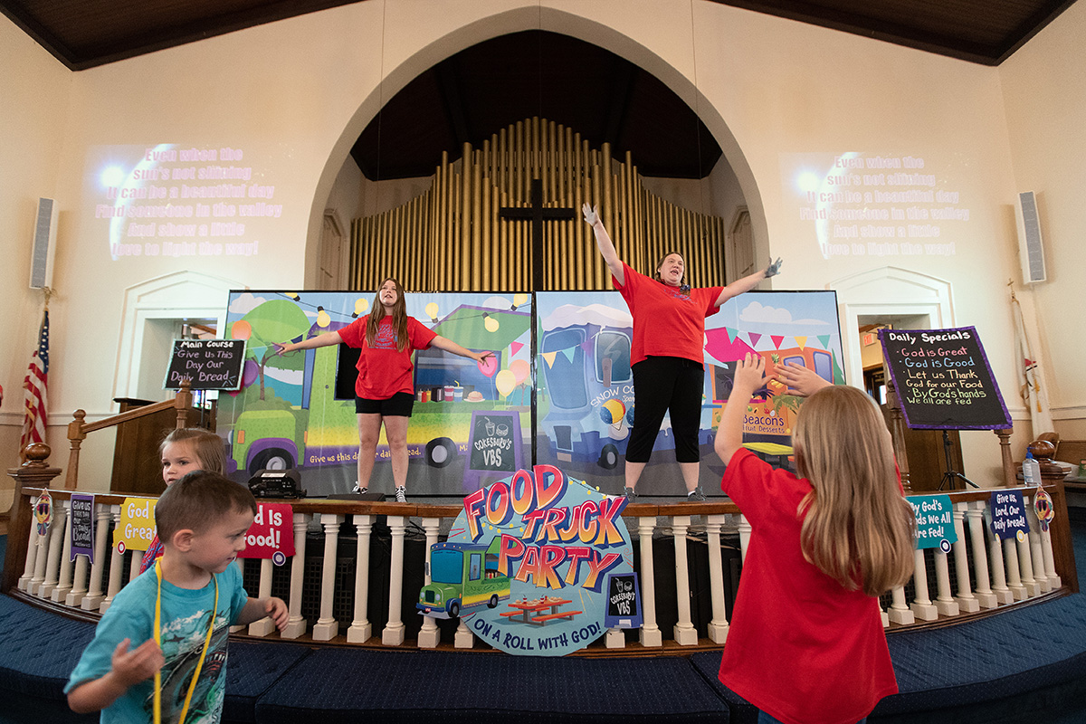 Children dance in front of the altar rail during vacation Bible school at Connell Memorial United Methodist Church in Goodlettsville, Tenn. The church served as a test site for a new VBS curriculum, “Food Truck Party,” which Cokesbury officially launched on June 30. Photo by Mike DuBose, UM News. Children dance in front of the altar rail during vacation Bible school at Connell Memorial United Methodist Church in Goodlettsville, Tenn. The church served as a test site for a new VBS curriculum, “Food Truck Party,” which Cokesbury officially launched on June 30. Photo by Mike DuBose, UM News.