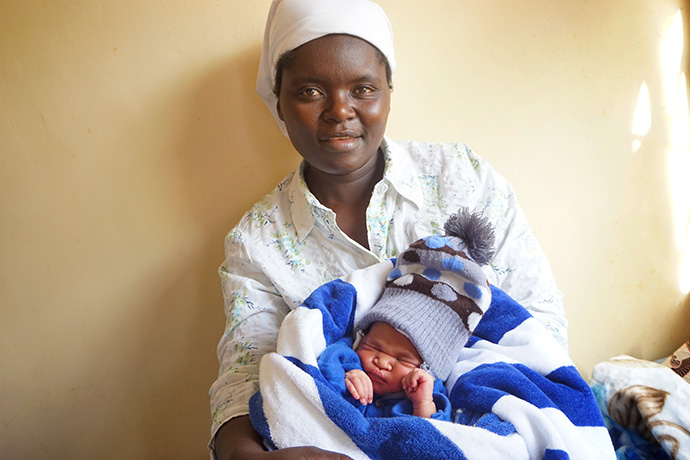 Ellen Mudzengerere cares for her newborn son at the United Methodist Chikwizo Clinic, one of six satellite health clinics operated by the Nyadire United Methodist Hospital. Photo by Kudzai Chingwe, UM News.