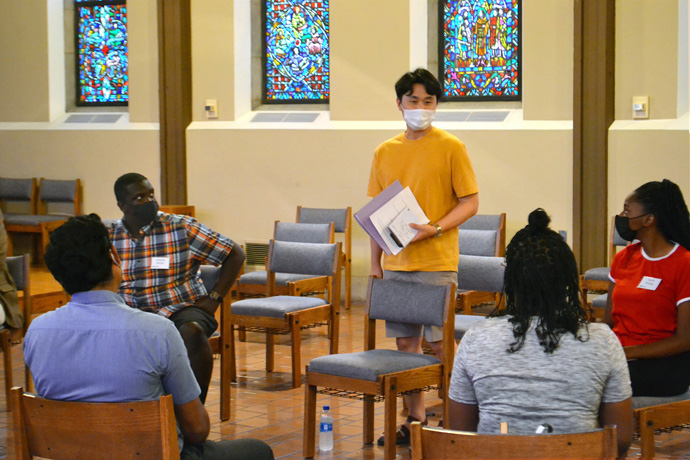 International students of Garrett-Evangelical Theological Seminary join in an orientation discussion on Aug. 23 at the United Methodist school’s campus in Evanston, Ill. The fall term marks a return to in-person classes and other in-person gatherings for Garrett, which went online only after the COVID-19 pandemic hit hard in March 2020. Photo by Shane Nichols.