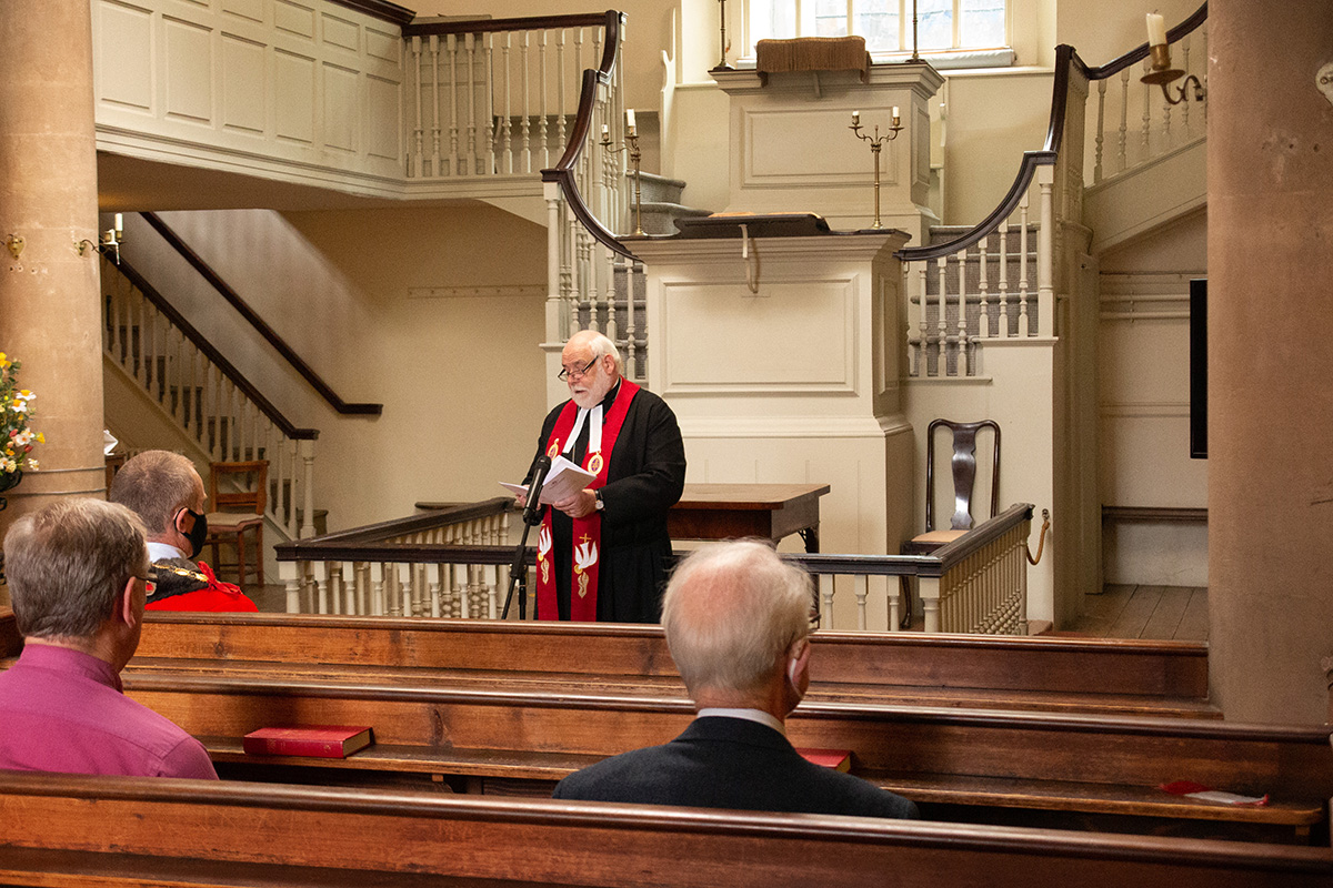 Standing in front of the pulpit of John Wesley’s New Room in Bristol, England, the Rev. Jonathan Pye leads a Sept. 12 service celebrating the 250th anniversary of Francis Asbury’s crossing of the Atlantic to America. Pye is the chair of the Bristol District of the Methodist Church in Britain and deputy chair of the trustees of John Wesley’s New Room. Attendance for the service was limited to allow for social distancing amid the COVID-19 pandemic. Photo by Tim Tanton, UM News. Standing in front of the pulpit of John Wesley’s New Room in Bristol, England, the Rev. Jonathan Pye leads a Sept. 12 service celebrating the 250th anniversary of Francis Asbury’s crossing of the Atlantic to America. Pye is the chair of the Bristol District of the Methodist Church in Britain and deputy chair of the trustees of John Wesley’s New Room. Attendance for the service was limited to allow for social distancing amid the COVID-19 pandemic. Photo by Tim Tanton, UM News.