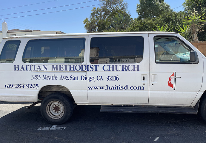 Many Haitian migrants who crossed into the U.S. at San Diego in 2016 saw the van belonging to Christ Ministry Center as a sign of hope. “When they saw the van that says Haitian United Methodist Church, they said that they saw Jesus,” said the Rev. Bill Jenkins, the center’s director. Photo by the Rev. Gustavo Vasquez, UM News. 
