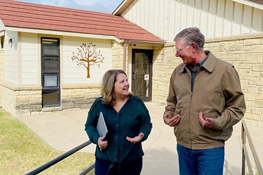 Lisa Buffum and Steve Wilke stroll the campus at The Richard and Julia Wilke Institute for Discipleship at Southwestern College, a United Methodist institution in Winfield, Kansas. They work on BeADisciple, an online learning program for Christians that became more popular during the coronavirus pandemic. Photo by Sara Weinert. Lisa Buffum and Steve Wilke stroll the campus at The Richard and Julia Wilke Institute for Discipleship at Southwestern College, a United Methodist institution in Winfield, Kansas. They work on BeADisciple, an online learning program for Christians that became more popular during the coronavirus pandemic. Photo by Sara Weinert.