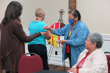 Josephine Deere serves communion to participants in an immersion experience held by The United Methodist Church’s Oklahoma Indian Missionary Conference. A group of 40 people spent several days learning about Native American history and culture, as well as challenges facing indigenous communities. Photo by Tim Tanton, UM News. Josephine Deere serves communion to participants in an immersion experience held by The United Methodist Church’s Oklahoma Indian Missionary Conference. A group of 40 people spent several days learning about Native American history and culture, as well as challenges facing indigenous communities. Photo by Tim Tanton, UM News.