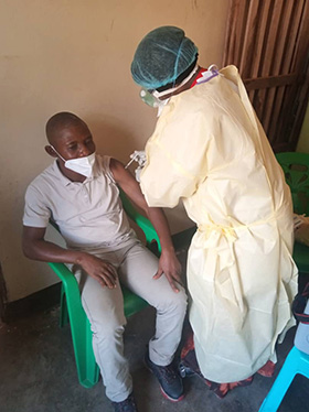 Jean Claude Lumbadisha, the treasurer of the Kivu Annual Conference, receives a COVID-19 vaccine in Bukavu, Congo. Photo by Chadrack Tambwe Londe, UM News.