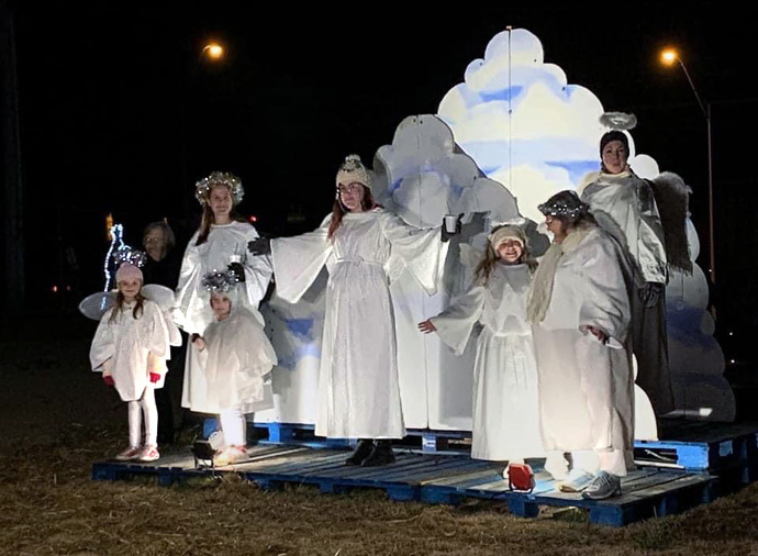 Children and women at St. Paul United Methodist Church in Lakeland, Tenn., perform as the angelic host during the church’s living Nativity this year. For the second year, the congregation held a drive-thru Nativity to help people stay safe from COVID-19 while sharing the Gospel message. Photo courtesy of St. Paul United Methodist Church. 