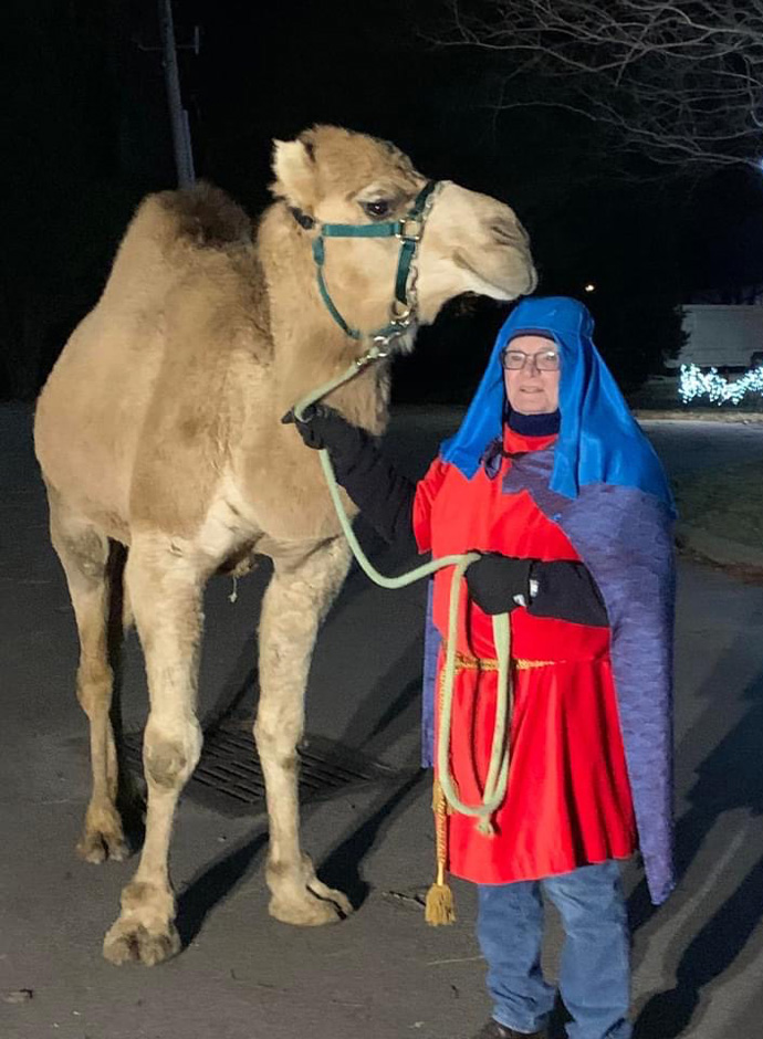 A camel is part of the fun of St. Paul United Methodist Church’s living Nativity. The church borrows animals from a farmer in Tupelo, Miss. More than 430 visitors came through this year’s drive-thru Nativity. Photo courtesy of St. Paul United Methodist Church.