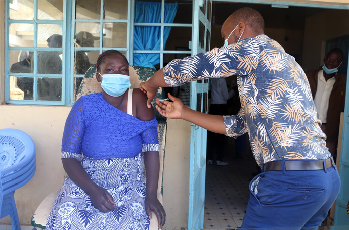 A member of First United Methodist Church in Moheto, Kenya, receives her dose after being encouraged by church leaders to do so. Religious leaders in Kenya introduced a three-month awareness effort, opening their houses of worship as vaccination sites. Photo by Gad Maiga, UM News.