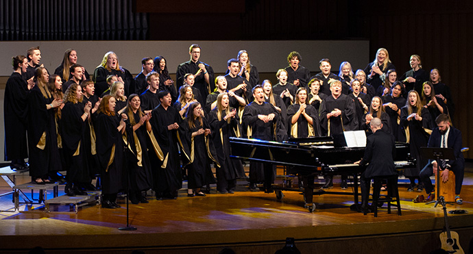 The Nebraska Wesleyan Choral Ensemble sings during a March 28 concert to benefit Ukraine. Photo © Allison Woods Photography.