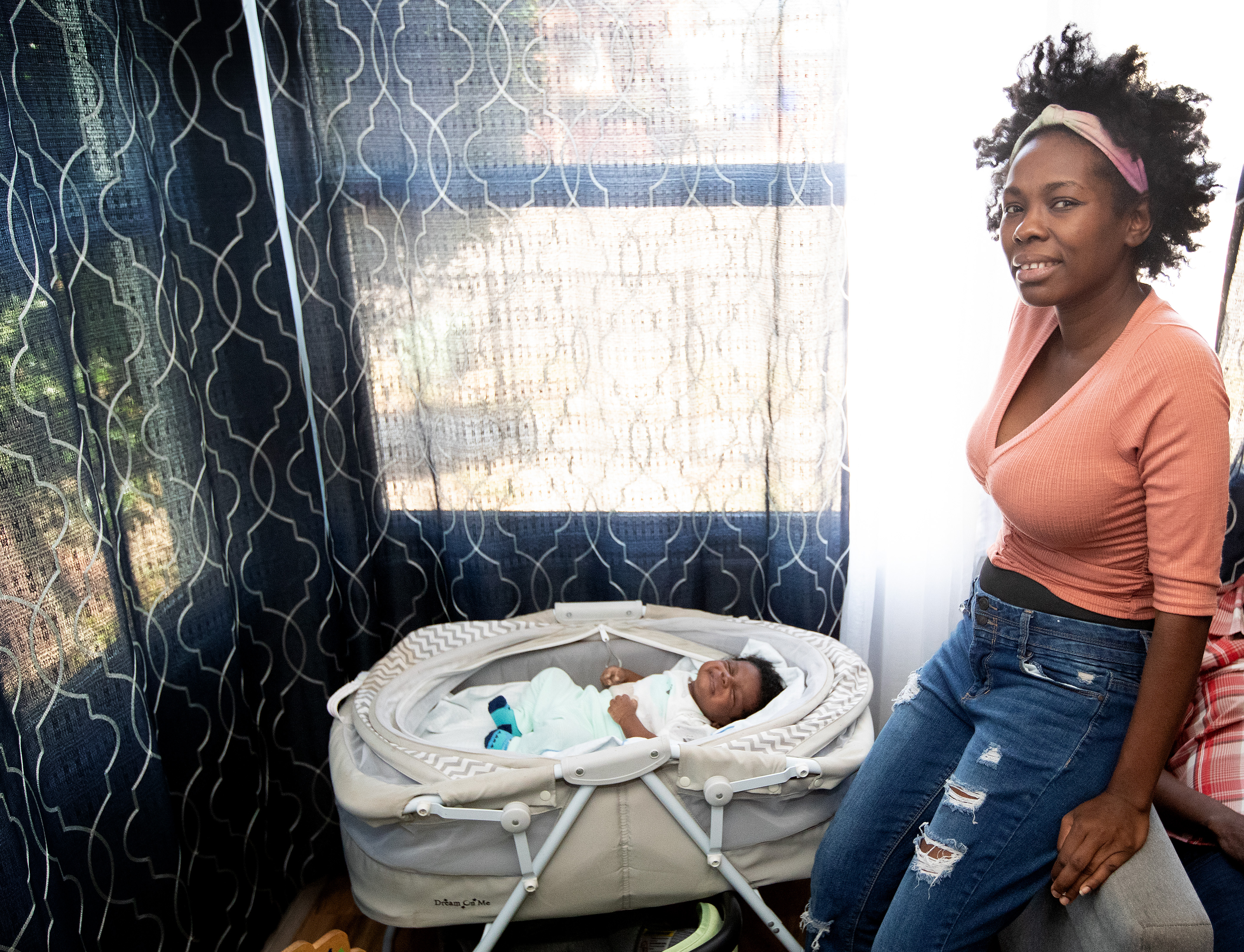 Haitian migrant Margarete Valcin and her son Dylan Barbot Valcin take refuge at Christ United Methodist Ministry Center in San Diego, California. Photo by Mike DuBose, UM News.