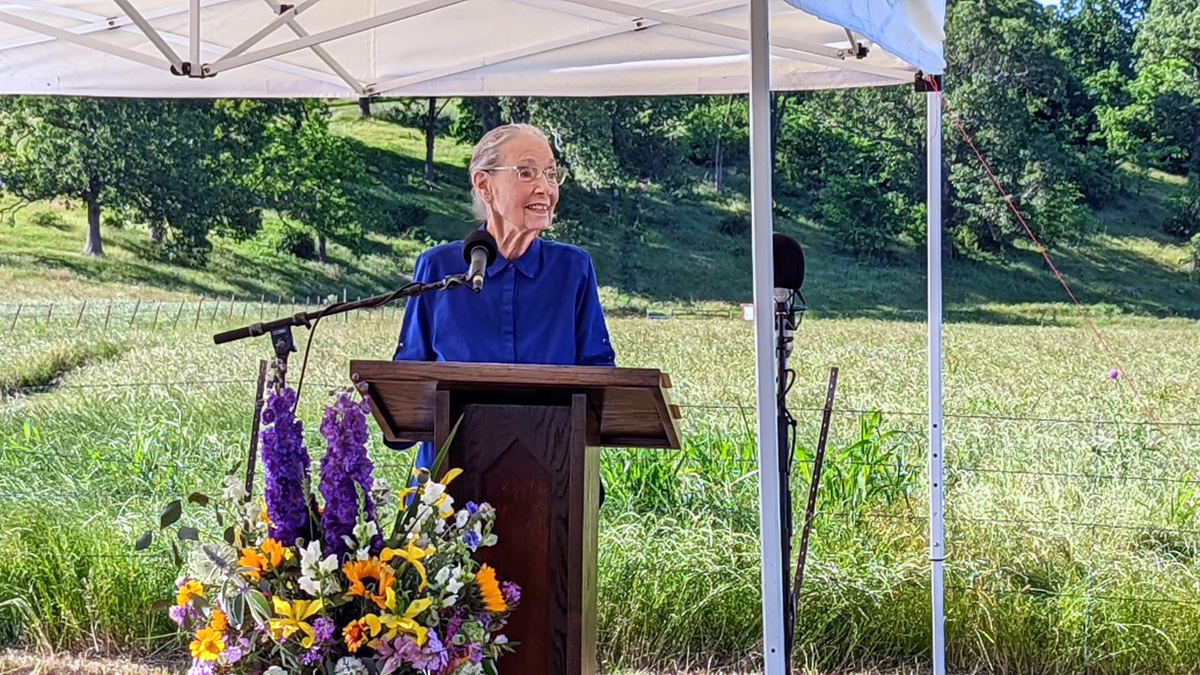 Betty Hinshaw addresses the crowd at the June 2 dedication of the Betty Hinshaw Bird Sanctuary in Tontitown, Arkansas. The 97-year-old United Methodist gave 25 acres to the Northwest Arkansas Land Trust for creation of the sanctuary. Photo courtesy of the Rev. Andrew Thompson