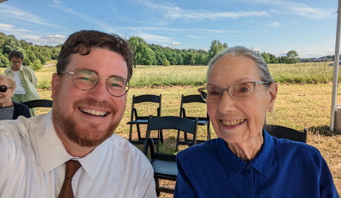 The Rev. Andrew Thompson shares a happy moment with Betty Hinshaw at the June 2 dedication of the Betty Hinshaw Bird Sanctuary. Thompson is pastor of First United Methodist Church of Springdale, Arkansas, where the 97-year-old Hinshaw has been a member for more than six decades. Photo courtesy of the Rev. Andrew Thompson.