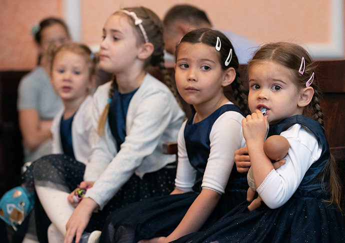 Children listen during worship at Prague 2 United Methodist Church. Photo by Mike DuBose, UM News. 