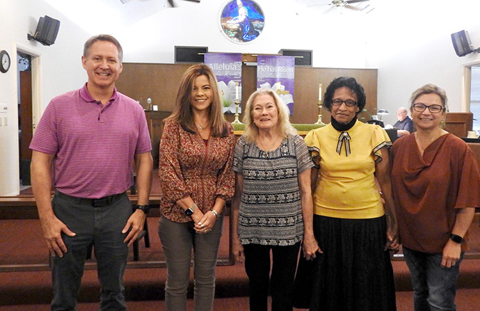 Three Hurricane Celia “babies,” with one mom and a nurse, pose for photos at First United Methodist Church of Aransas Pass, Texas, after a special reunion service on Aug. 14. Hurricane Celia battered Aransas Pass on Aug. 3, 1970, and the church filled in as the community hospital for four months, seeing more than 80 births. Pictured from left: Jere Allen (born at the church), Angie Rodriguez (born at the church), Billie Robinson (gave birth at the church), Ernestine “Ernie” Brown (did nursing at the church) and Angel Childs (born at the church). Photo by Sam Hodges, UM News.