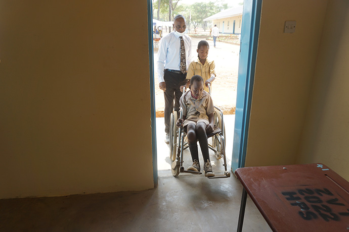 Brendon Chaparira can access his classroom more easily after ramps were installed during construction of a new classroom block at the school. Photo by Kudzai Chingwe, UM News.