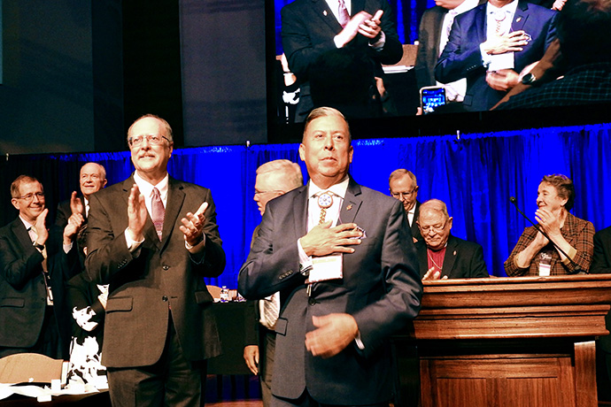 The Rev. David Wilson, the first Native American United Methodist bishop, accepts congratulations after his election to the episcopacy at the South Central Jurisdictional Conference Nov. 2, in Houston. Photo by Sam Hodges, UM News.