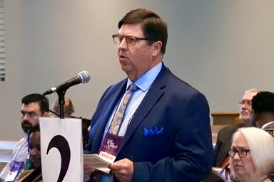 The Rev. Stan Copeland speaks Nov. 3 at the South Central Jurisdictional Conference in Houston. Copeland criticized in a floor speech three United Methodist bishops for being pro-Global Methodist Church. Photo by Sam Hodges, UM News.