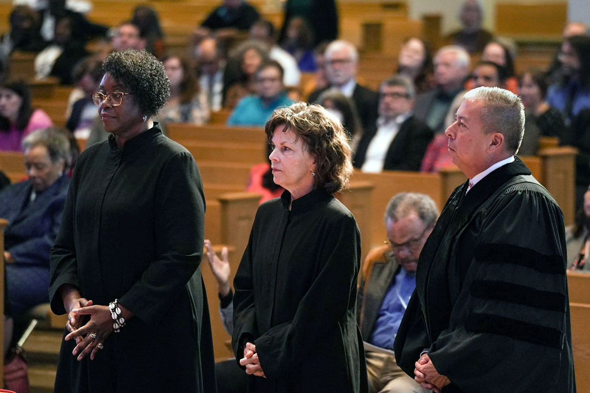 In an episcopal election that saw several firsts, the Rev. Delores Williamston (left), the first Black female bishop elected to the South Central Jurisdiction; the Rev. David Wilson (right), the first Native American bishop in The United Methodist Church; and the Rev. Laura Merrill stand during their consecration service. The South Central Jurisdiction’s service of consecration was Nov. 5 at Houston First United Methodist Church. Photo courtesy of the Louisiana Conference via Facebook.
