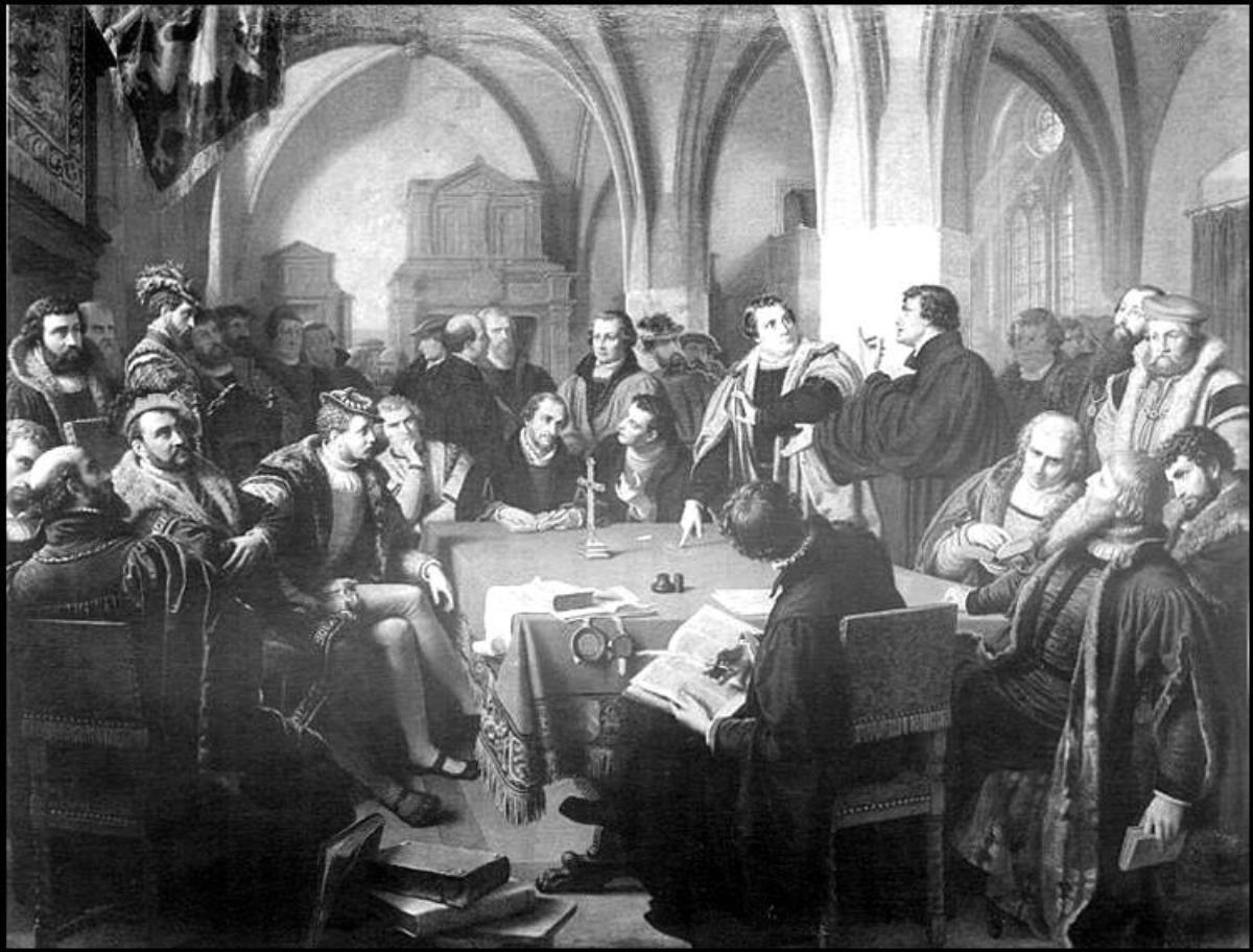 독일 화가 크리스티안 칼 아우구스트 노크가 1869년에 그린 유화로, 마르틴 루터와 츠빙글리가 성찬식에서 그리스도가 어떻게 임재하시는가에 대해 열띤 토론을 벌였던 마르부르크 회담을 묘사하고 있다. 이 논쟁은 결국 루터파와 츠빙글리파로 분열하는 출발점이 되었다. 이 그림의 소유는 독일의 마버그(Marburg)에 있는 Gymnasium Philippinum 학교에 있다. 그림 제공, 위키미디어 커먼즈.