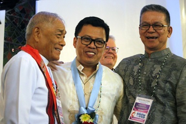 Newly elected Bishop Israel M. Painit (center) is greeted by retired Bishop Solito K. Toquero and Bishop Ciriaco Q. Francisco after Painit’s election during the Philippines Central Conference at Wesleyan University-Philippines in Cabanatuan City, Philippines. Painit was the third bishop elected at the Nov. 24-26 meeting. Photo by Gladys P. Mangiduyos, UM News. 