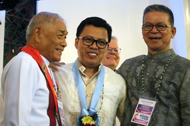 Newly elected Bishop Israel M. Painit (center) is greeted by retired Bishop Solito K. Toquero and Bishop Ciriaco Q. Francisco after Painit’s election during the Philippines Central Conference at Wesleyan University-Philippines in Cabanatuan City, Philippines. Painit was the third bishop elected at the Nov. 24-26 meeting. Photo by Gladys P. Mangiduyos, UM News.  Newly elected Bishop Israel M. Painit (center) is greeted by retired Bishop Solito K. Toquero and Bishop Ciriaco Q. Francisco after Painit’s election during the Philippines Central Conference at Wesleyan University-Philippines in Cabanatuan City, Philippines. Painit was the third bishop elected at the Nov. 24-26 meeting. Photo by Gladys P. Mangiduyos, UM News.