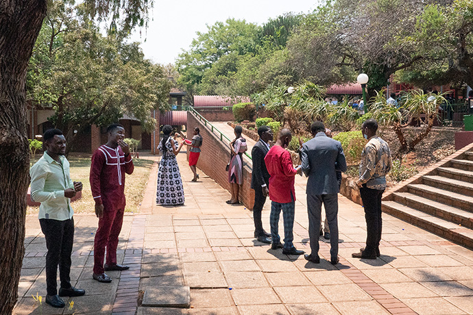 Africa University students visit following worship at the Kwang Lim Chapel. Africa University’s 28th graduating class included 712 graduates from 18 African countries. Of the more than 11,000 alumni since the first graduating class in 1994, more than 90 percent are in leadership roles on the continent of Africa, said Jim Salley, president and chief executive officer of Africa University (Tennessee) Inc. Photo by Kathy L. Gilbert, UM News.