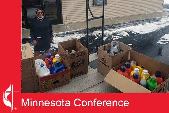 The Rev. Yolanda Williams helps load donated supplies at her church, Glenwood United Parish, which was a drop-off location for other congregations. Photo courtesy of the Minnesota Conference.