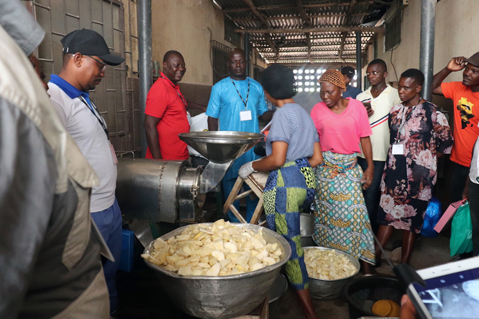 At the juice-processing plant of the Songhai Center in Porto-Novo, Benin, participants learn how pineapple juice is processed using no chemical or harmful preservatives. Yambasu Agriculture Initiative staff from 15 annual conferences attended the training over a six-week period in September and November. The Global Ministries-supported initiative is named after the late bishop John K. Yambasu, who was a fervent believer that United Methodist conferences in Africa can be self-reliant through agriculture. Photo by Phileas Jusu, UM News.