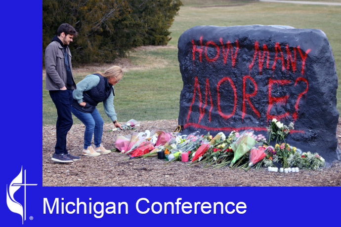 In response to the Feb. 13 mass shooting at Michigan State University, someone painted this question in large red letters across "The Rock." Photo by Mark Doyal, Michigan Conference.
