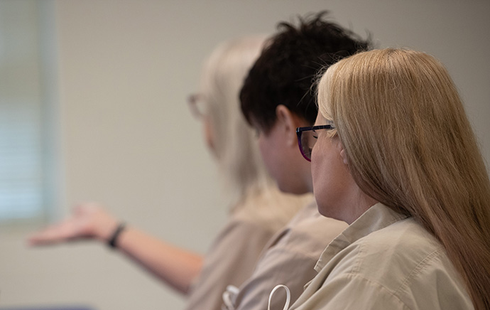 Dee, Michelle and Rebecca discuss the impact that Kairos Prison Ministry has had on their lives and that of other inmates at the Lakin Correctional Center in West Columbia, W.Va. Photo by Mike DuBose, UM News.