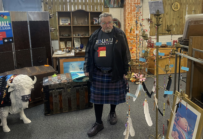 RoBear Wilson, a retired United Methodist pastor from Pittsburgh, browses March 9, 2023, at Oklahoma Native Art and Jewelry in Oklahoma City. Wilson was part of a group taking part in the Oklahoma Indian Missionary Conference Immersion Experience. Photo by Jim Patterson, UM News.