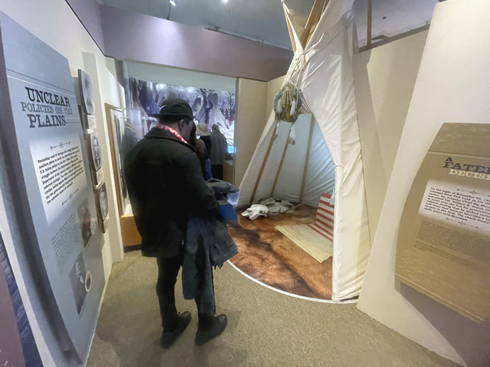 Felix Jibrin, a student at Boston University School of Theology, looks at an exhibit of a teepee on March 9, 2023, at the First Americans Museum in Oklahoma City. Photo by Jim Patterson, UM News.