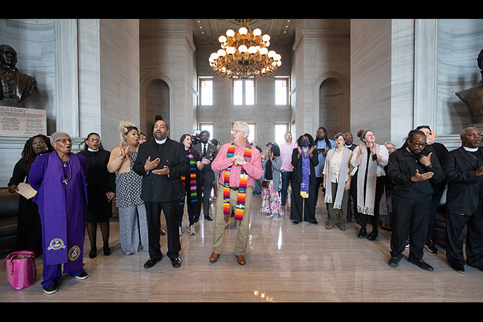 Clergy and other supporters of gun reform sing during a gathering at the Tennessee State Capitol in Nashville. United Methodist and other Christian clergy called on state legislators to enact tighter gun control following a recent school shooting in Nashville. Photo by Mike DuBose, UM News.