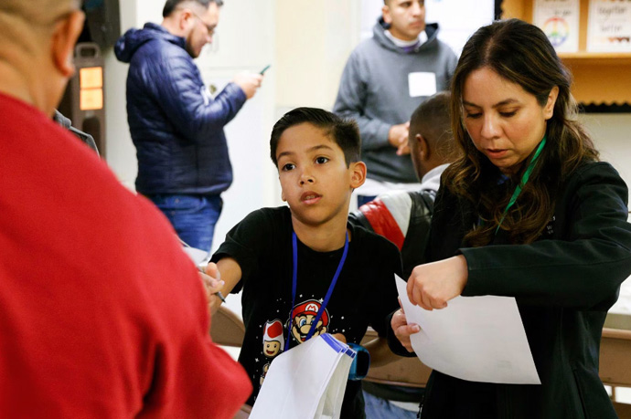 Nine-year-old Asher Vargas has become a celebrated volunteer in the migrant welcome center at Dallas’ Oak Lawn United Methodist Church. “He’s been such an incredible inspiration,” says Associate Pastor Isabel Marquez. Photo courtesy Oak Lawn United Methodist Church.