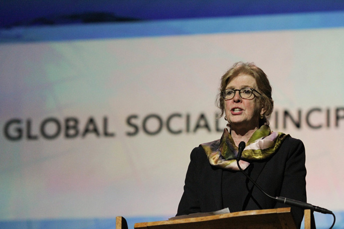 The Rev. Susan Henry-Crowe, top executive of the denomination's Board of Church and Society, presents the Global Social Principles to the May 16 plenary of the United Methodist 2016 General Conference in Portland, Ore. During her tenure with the agency, Henry-Crowe was instrumental in the major rewriting of the United Methodist Social Principles. File photo by Maile Bradfield, UM News.