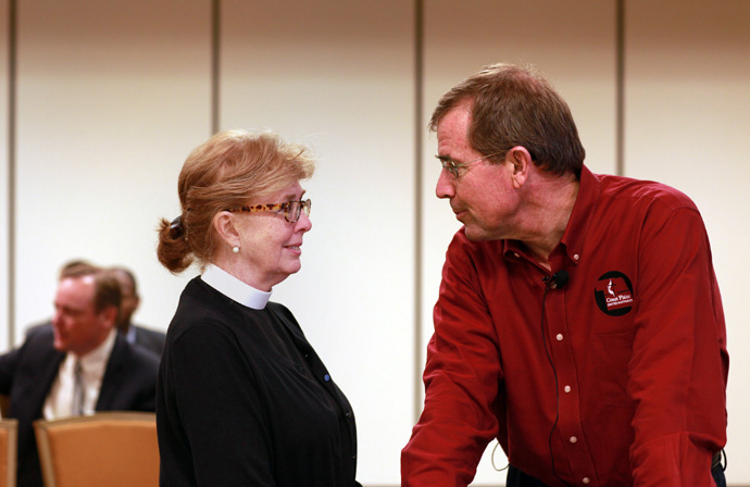 The Rev. Susan Henry-Crowe, top executive of the United Methodist Board of Church and Society, and Bishop Scott Jones talk prior to a discussion on the implications of the church’s sexuality debate held in Nashville, Tenn., in 2014. Henry-Crowe retired at the end of 2022 after eight years leading the church’s social justice agency. File photo by Kathleen Barry, United Methodist Communications.