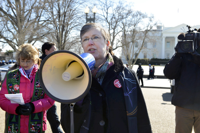 Harriet Jane Olson speaks in front of the White House in Washington in 2014 in support of progress on immigration reform and an end to deportations. “My whole adult life I’ve been engaged on working on faith formation with one group or another,” Olson said. File photo by Jay Mallin, UM News.