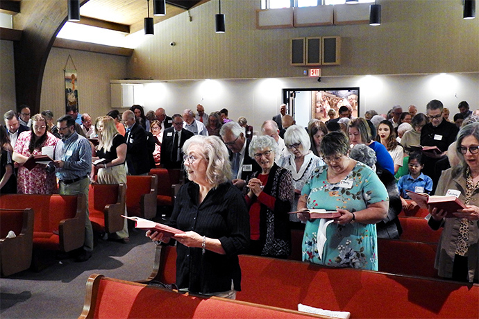 A June 4 worship service of Amarillo United Methodist Church nearly fills the sanctuary of St. Luke Presbyterian Church in Amarillo. St. Luke has provided space for the new United Methodist congregation, which formed because other United Methodist churches of the city have disaffiliated or taken steps to do so. The Amarillo United Methodist Church had its chartering conference right after this worship service. Photo by Sam Hodges, UM News.