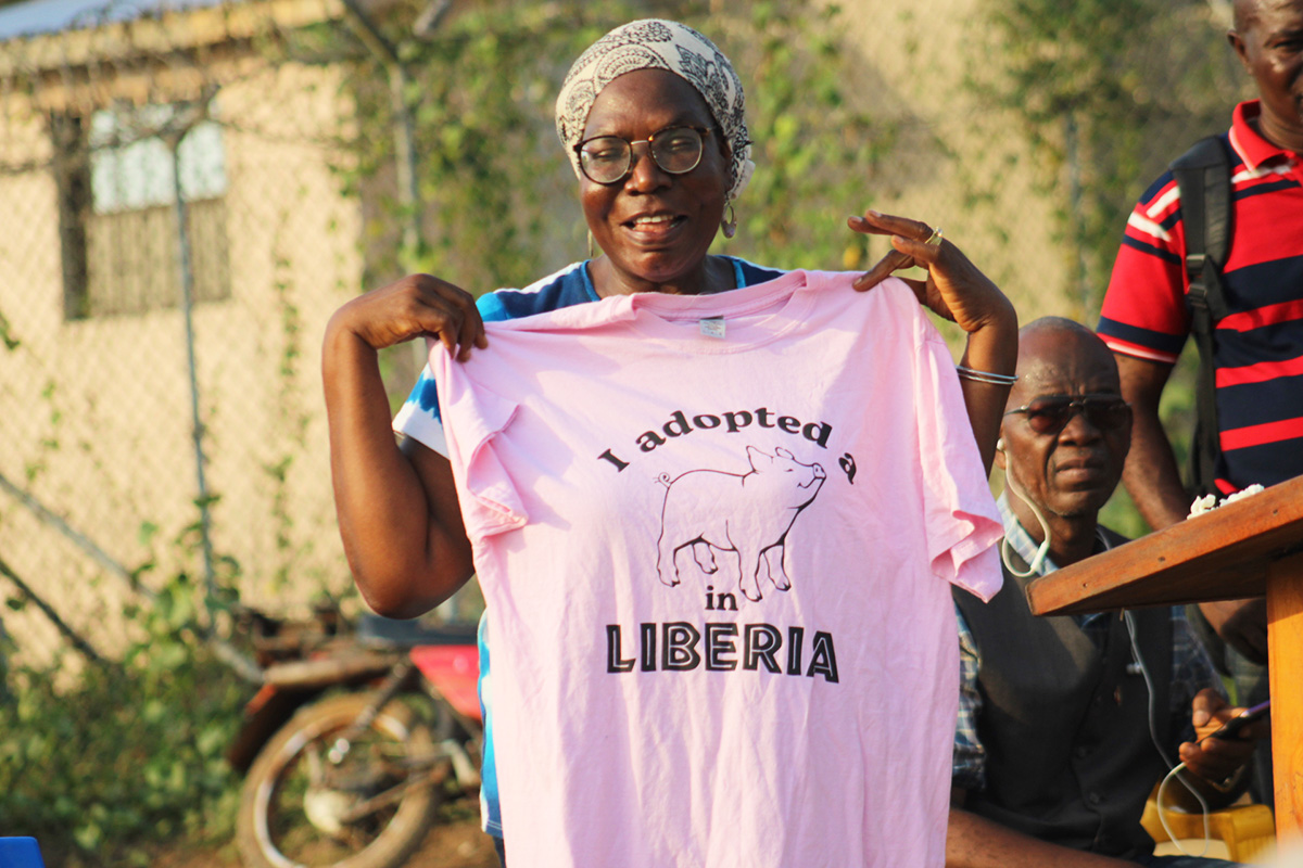 Priscilla Legay Jaiah-Gilayeneh, director of the Ganta Mission Station in Liberia’s Nimba County, displays a pig farming T-shirt during the dedication ceremony of a new butchery plant in Ganta City. Photo by E Julu Swen, UM News.