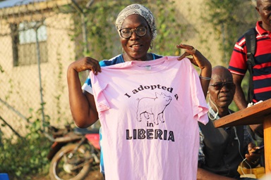 Priscilla Legay Jaiah-Gilayeneh, director of the Ganta Mission Station in Liberia’s Nimba County, displays a pig farming T-shirt during the dedication ceremony of a new butchery plant in Ganta City. Photo by E Julu Swen, UM News. Priscilla Legay Jaiah-Gilayeneh, director of the Ganta Mission Station in Liberia’s Nimba County, displays a pig farming T-shirt during the dedication ceremony of a new butchery plant in Ganta City. Photo by E Julu Swen, UM News.