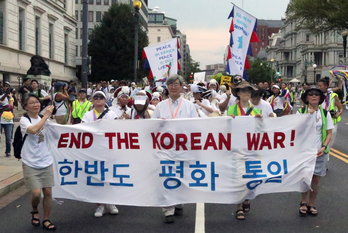 Hundreds of Korea Peace Action participants march from Lafayette Square in front of the U.S. White House to the Lincoln Memorial in Washington on July 27, the 70th anniversary of the Armistice Agreement of the Korean War. The march was part of a three-day convening called the National Mobilization to End the Korean War. Photo by the Rev. Thomas E. Kim, UM News.