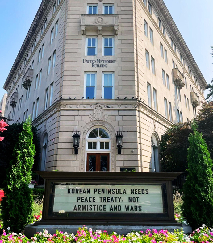The sign on the United Methodist Building in Washington on July 26 reflects a call for lasting peace on the Korean Peninsula. Photo courtesy of the United Methodist Board of Church and Society.