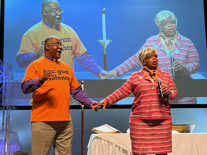 Bishop Julius C. Trimble and First Lady Racelder Grandberry-Trimble get the Indiana Annual Conference session off to an uplifting start as they share their faith journey. The conference focused on the future with the theme of “Praying Forward: No Turning Back” at its meeting June 8-10 in Muncie, Indiana. Photo by Tim Tanton, UM News.