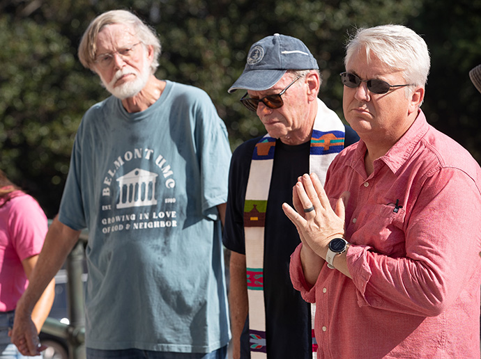 The Revs. Paul Purdue (right) and Ken Edwards (center) join in prayer with Mike Engle during a prayer vigil in support of gun reform at the Tennessee State Capitol in Nashville on Aug. 21. Purdue is senior pastor of Belmont United Methodist Church in Nashville, Edwards is retired clergy from the Tennessee-Western Kentucky Conference and Engle is a public defender in Nashville and member of Belmont. Photo by Mike DuBose, UM News.
