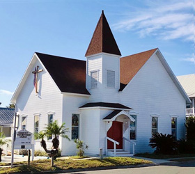 Cedar Key United Methodist Church, which draws a number of snow birds each winter and held an activity-packed vacation Bible school this summer, is one of the many structures flooded by Hurricane Idalia. The island of Cedar Key is about four miles off the Florida mainland in the Gulf of Mexico. Photo courtesy of the Florida Conference. 