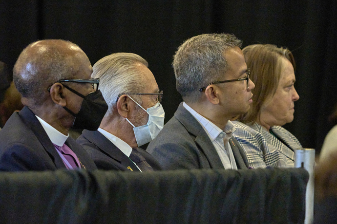 Several United Methodist bishops are in attendance at the church trial of Bishop Minerva G. Carcaño in Glenview, Ill. Among them are, from left, retired Bishop Marcus Matthews, retired Bishop Elias Galvan, Bishop Carlo Rapanut, and Bishop Dottie Escobedo-Frank. Photo by Paul Jeffrey, UM News.